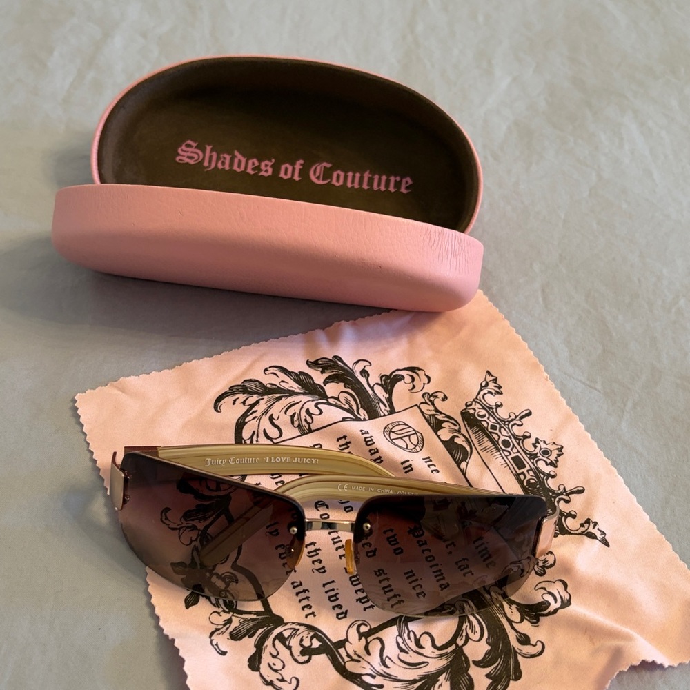Juicy Couture Sunglasses with Pink Case and dust cloth.
